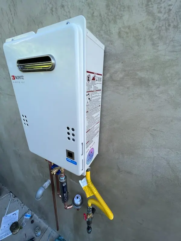 Tankless water heater installation for One Stop homes
